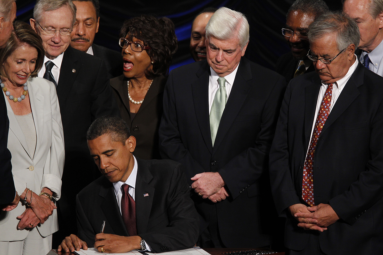 President Obama signs the Dodd-Frank Act