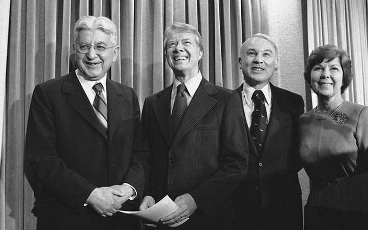 Fed Chairman Arthur Burns (left) with President Jimmy Carter, future Fed Chairman G. William Miller, and Miller's wife Ariadna Miller