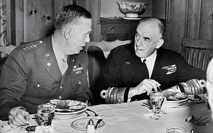 U.S. Army Chief of Staff George C. Marshall and British Admiral Sir Dudley Pound talk at luncheon held for British and American naval chiefs at the Federal Reserve building in Washington, D.C., January 17, 1942