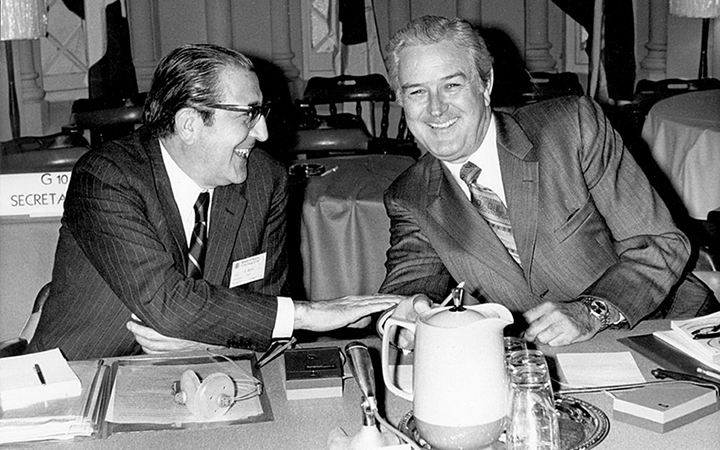 Rinaldo Ossola, deputy governor of the Bank of Italy (left) chats with John Connally (right), U.S. Treasury Secretary and chairman of the meeting of the Group of Ten at the December 1971 meeting at the Smithsonian